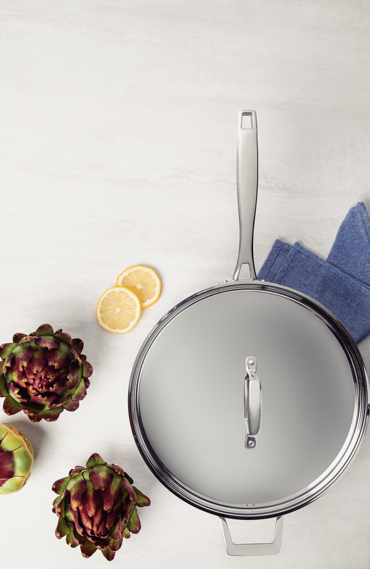 <tc>Tramontina GRANO 30 cm 5,6 l roostevabast terasest praepann koos kolmekihilise keha, kaane ja pika käepidemega</tc>